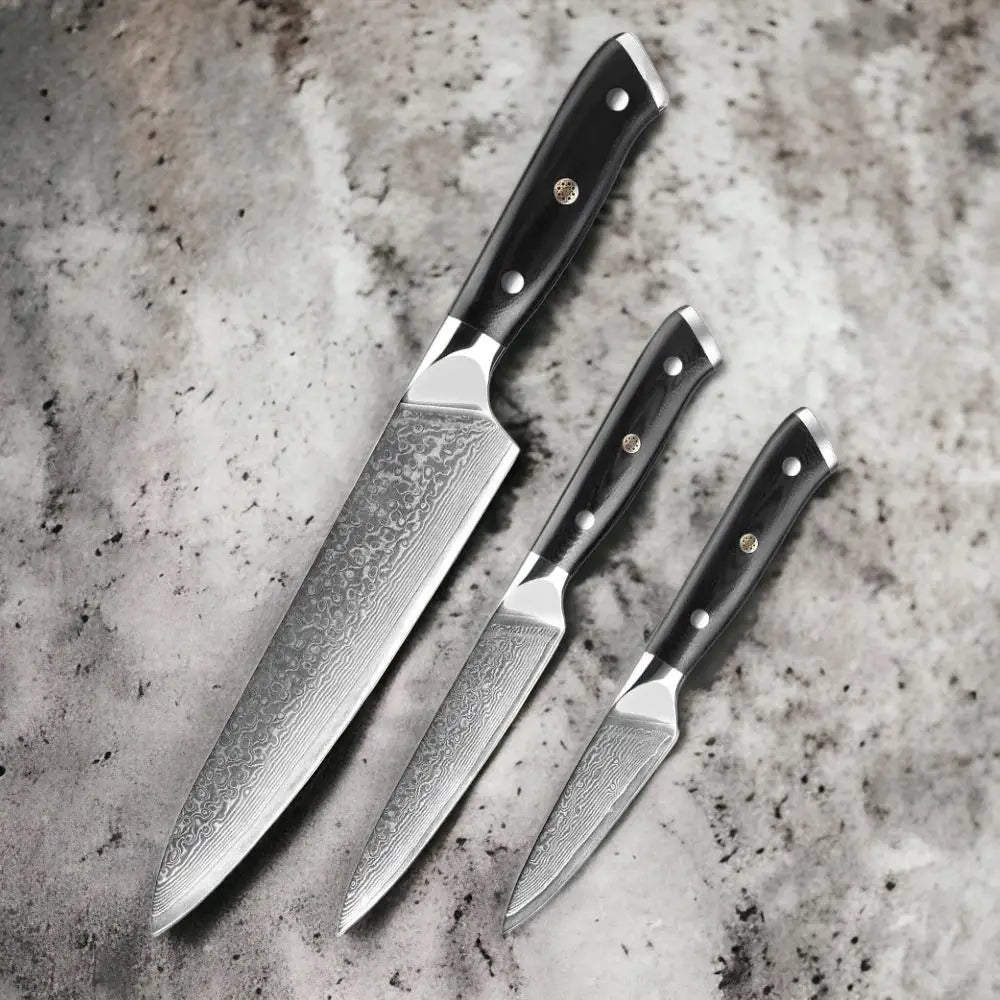 3 Piece Damascus Steel Knife Set (Executive Series) . a photo showing a chef knife, a utility knife and a paring knife.